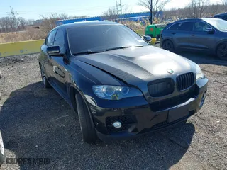 2012 BMW X6 50i with VIN 5UXFG8C57CL590534, listed as a IAAI auction lot 41796304 with 1 mi miles. Bid and sale history available at carsss.com. Image 1.