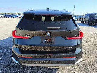 2024 BMW X1 xDrive28i z VIN WBX73EF08R5Y90826, wystawiony jako Copart lot #56059065 z przebiegiem 18 928 mil mil oraz Tytuł czysty. Historia ofert i sprzedaży dostępna na DreamBid. Obrazek 6.