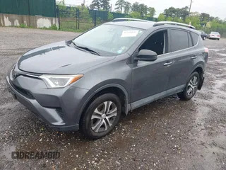 2017 Toyota RAV4 LE with VIN 2T3BFREV5HW603663, listed as a IAAI auction lot 42221653 with 102,734 mi miles and . Bid and sale history available at DreamBid. Image 2.