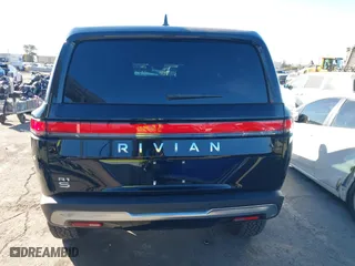 2025 Rivian R1S Adventure with VIN 7PDSGBBA4SN047584, listed as a IAAI auction lot 41372645 with 501 mi miles. Bid and sale history available at carsss.com. Image 17.