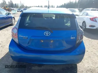 2014 Toyota Prius One with VIN JTDKDTB32E1574929, listed as a IAAI auction lot 39091611 with 128,131 mi miles and . Bid and sale history available at DreamBid. Image 16.