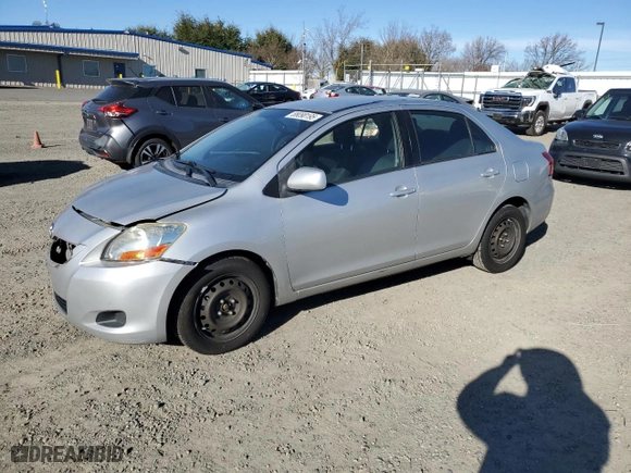 2011 Toyota Yaris with VIN JTDBT4K35B1409879, listed as a Copart auction lot 88090195 with 133,900 mi miles and Salvage Title. Bid and sale history available at carsss.com. Image 1.