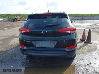 2017 Hyundai Tucson SE Plus with VIN KM8J33A41HU327540, listed as a IAAI auction lot 41820850 with 129,227 mi miles. Bid and sale history available at carsss.com. Image 16.
