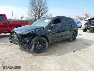 2023 Volkswagen Tiguan SE R-Line Black with VIN 3VV8B7AX4PM019421, listed as a IAAI auction lot 41885691 with 36,332 mi miles. Bid and sale history available at carsss.com. Image 2.