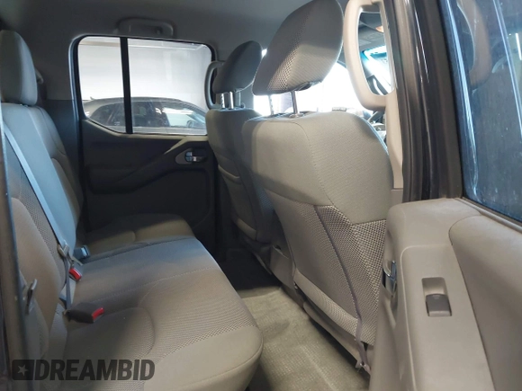 2015 Nissan Frontier Pro-4X with VIN 1N6AD0EV6FN735426, listed as a IAAI auction lot 42596253 with 183,493 mi miles and . Bid and sale history available at DreamBid. Image 8.