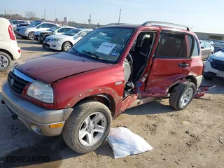 2002 Suzuki Grand Vitara JLX with VIN JS3TD62V824152943, listed as a IAAI auction lot 41668395 with 104,191 mi miles. Bid and sale history available at carsss.com. Image 2.