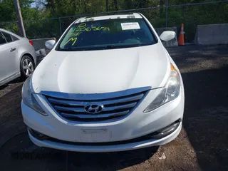 2014 Hyundai Sonata Limited with VIN 5NPEC4AB6EH938762, listed as a IAAI auction lot 42065654 with 205,483 mi miles and . Bid and sale history available at DreamBid. Image 12.