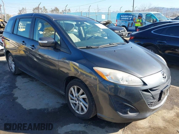 2014 Mazda 5 Sport with VIN JM1CW2BL5E0166522, listed as a IAAI auction lot 41635454 with 94,225 mi miles and . Bid and sale history available at DreamBid. Image 1.