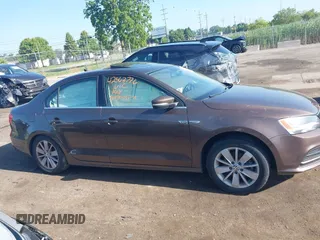 2015 Volkswagen Jetta Sport z VIN 3VWD17AJ5FM411217, wystawiony jako IAAI lot #42563776 z przebiegiem 84 520 mil mil oraz . Historia ofert i sprzedaży dostępna na DreamBid. Obrazek 13.