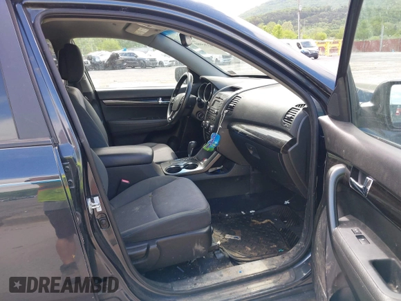 2013 Kia Sorento LX with VIN 5XYKTCA60DG403769, listed as a IAAI auction lot 42265980 with 215,013 mi miles and . Bid and sale history available at DreamBid. Image 5.