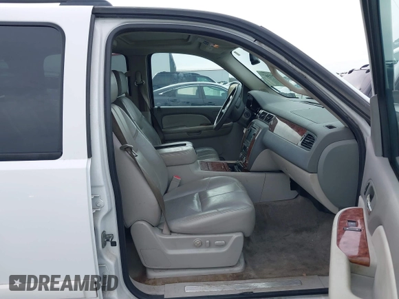 2008 Chevrolet Suburban LTZ with VIN 1GNFC16018R143195, listed as a IAAI auction lot 41577367 with 223,506 mi miles and . Bid and sale history available at DreamBid. Image 5.