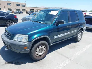 1998 Honda CR-V LX z VIN JHLRD1843WC083751, wystawiony jako IAAI lot #42356438 z przebiegiem 167 342 mil mil oraz . Historia ofert i sprzedaży dostępna na DreamBid. Obrazek 17.
