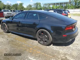 2017 Audi RS 7 Prestige z VIN WUAWAAFC6HN902717, wystawiony jako Copart lot #61811494 z przebiegiem 103 547 mil mil oraz Szkody całkowita. Historia ofert i sprzedaży dostępna na DreamBid. Obrazek 2.
