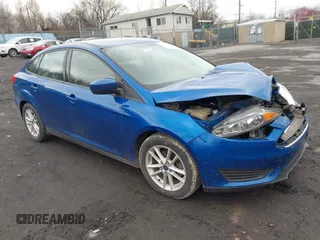 2018 Ford Focus SE z VIN 1FADP3F23JL200674, wystawiony jako IAAI lot #42009238 z przebiegiem 78 007 mil mil oraz . Historia ofert i sprzedaży dostępna na DreamBid. Obrazek 1.