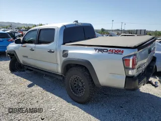 2023 Toyota Tacoma SR with VIN 3TMCZ5AN8PM545588, listed as a Copart auction lot 57528655 with 73,286 mi miles and Salvage title. Bid and sale history available at DreamBid. Image 2.