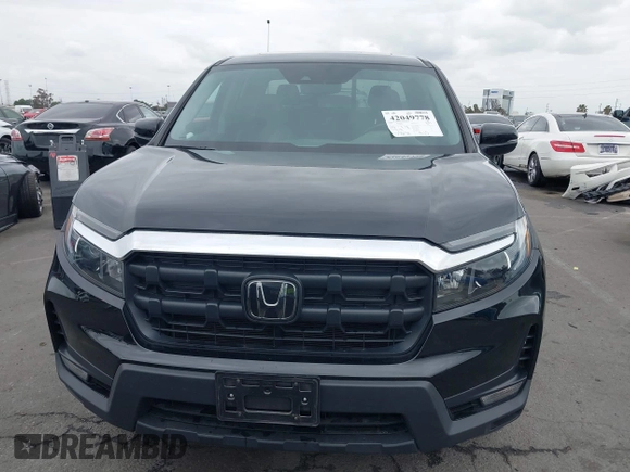 2024 Honda Ridgeline RTL with VIN 5FPYK3F56RB004027, listed as a IAAI auction lot 42049778 with 35,631 mi miles and . Bid and sale history available at DreamBid. Image 6.