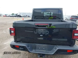 2023 Jeep Gladiator Overland with VIN 1C6HJTFG6PL555153, listed as a IAAI auction lot 42210878 with 40,576 mi miles and . Bid and sale history available at DreamBid. Image 17.