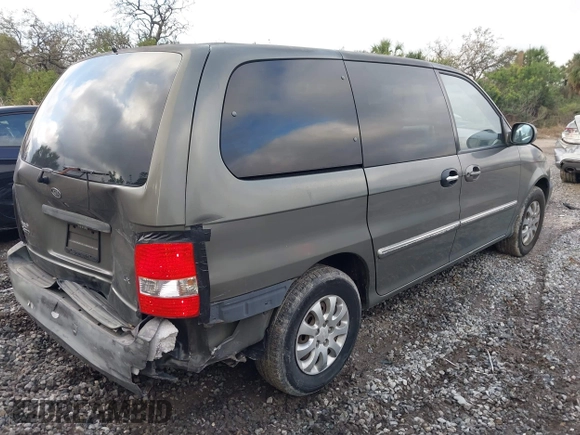 2004 Kia Sedona LX with VIN KNDUP131346533373, listed as a IAAI auction lot 41632342 with 76,545 mi miles. Bid and sale history available at carsss.com. Image 4.