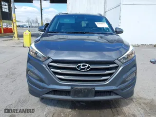 2016 Hyundai Tucson Sport with VIN KM8J33A2XGU022633, listed as a IAAI auction lot 41990348 with 73,395 mi miles. Bid and sale history available at carsss.com. Image 13.