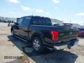 2015 Ford F-150 XL with VIN 1FTEW1CFXFFA37573, listed as a IAAI auction lot 42054120 with 125,822 mi miles. Bid and sale history available at carsss.com. Image 3.
