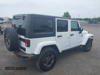 2017 Jeep Wrangler Unlimited 75th Anniversary z VIN 1C4HJWEG8HL502984, wystawiony jako IAAI lot #42354671 z przebiegiem 108 900 mil mil oraz . Historia ofert i sprzedaży dostępna na DreamBid. Obrazek 4.