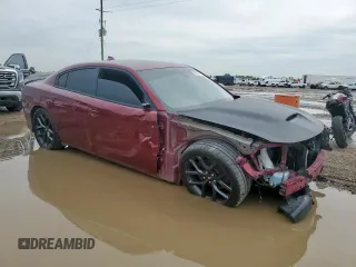 2021 Dodge Charger R/T with VIN 2C3CDXCT6MH504218, listed as a Copart auction lot 60407915 with 67,596 mi miles and Salvage title. Bid and sale history available at DreamBid. Image 4.