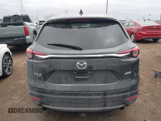 2018 Mazda CX-9 Touring with VIN JM3TCBCY3J0212479, listed as a IAAI auction lot 41737024 with 128,552 mi miles and . Bid and sale history available at DreamBid. Image 16.