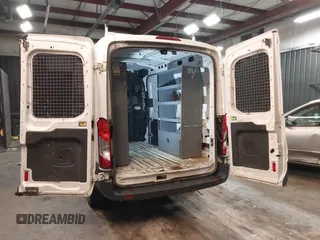 2016 Ford Transit Cargo with VIN 1FTYR1CM2GKA12288, listed as a IAAI auction lot 41752611 with 238,715 mi miles and . Bid and sale history available at DreamBid. Image 3.