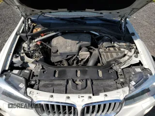 2015 BMW X4 xDrive28i with VIN 5UXXW3C51F0M89005, listed as a Copart auction lot 57392984 with 142,385 mi miles. Bid and sale history available at carsss.com. Image 12.