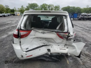 2015 Toyota Sienna LE with VIN 5TDJK3DCXFS126604, listed as a Copart auction lot 56987355 with 102,079 mi miles and Salvage title. Bid and sale history available at DreamBid. Image 6.