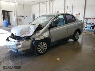 2001 Toyota ECHO with VIN JTDBT123110105869, listed as a Copart auction lot 79242824 with 194,146 mi miles and Salvage Title. Bid and sale history available at carsss.com. Image 1.