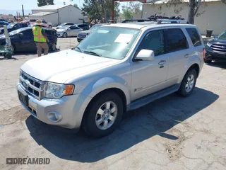 2009 Ford Escape Hybrid with VIN 1FMCU49309KC11542, listed as a IAAI auction lot 42028593 with 168,573 mi miles. Bid and sale history available at carsss.com. Image 2.