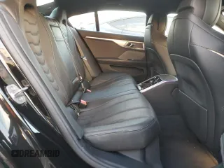 2023 BMW 8 Series 840i with VIN WBAGV2C01PCK95705, listed as a Copart auction lot 83424634 with 23,674 mi miles and Salvage Title. Bid and sale history available at carsss.com. Image 11.