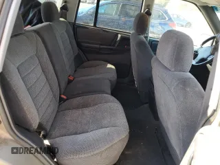 1998 Jeep Grand Cherokee Laredo with VIN 1J4GZ58S5WC165213, listed as a Copart auction lot 77611434 with 168,688 mi miles and Salvage Title. Bid and sale history available at carsss.com. Image 11.