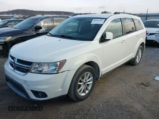 2014 Dodge Journey SXT with VIN 3C4PDCBG6ET189875, listed as a IAAI auction lot 40965845 with 174,292 mi miles and . Bid and sale history available at DreamBid. Image 2.
