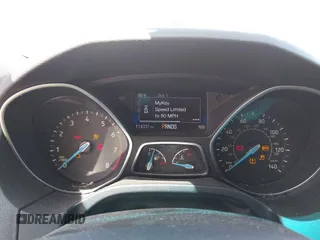 2016 Ford Focus SE with VIN 1FADP3F27GL385739, listed as a IAAI auction lot 42400329 with 114,331 mi miles and . Bid and sale history available at DreamBid. Image 7.