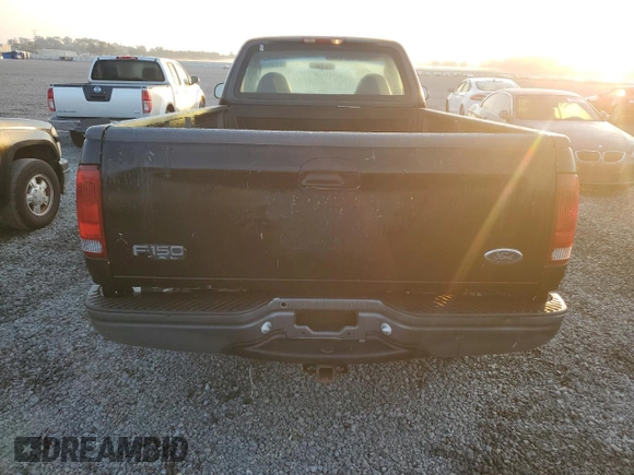 2003 Ford F-150 XL with VIN 1FTRF17W13NA97772, listed as a Copart auction lot 77692074 with Not Provided miles and Salvage Title. Bid and sale history available at DreamBid. Image 6.