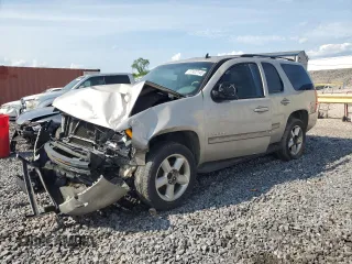 2007 Chevrolet Tahoe LTZ with VIN 1GNFK13077J124025, listed as a Copart auction lot 57422145 with 169,455 mi miles and Salvage title. Bid and sale history available at DreamBid. Image 1.