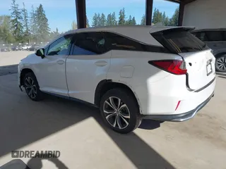 2021 Lexus RX with VIN JTJHZKFA2M2030841, listed as a IAAI auction lot 42009263 with 38,113 mi miles. Bid and sale history available at carsss.com. Image 3.