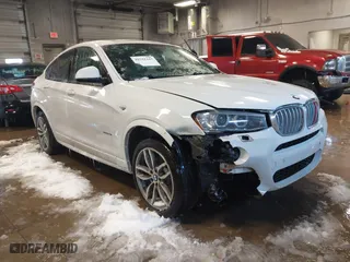 2016 BMW X4 xDrive35i with VIN 5UXXW5C54G0N92321, listed as a IAAI auction lot 41581445 with 169,498 mi miles. Bid and sale history available at carsss.com. Image 1.