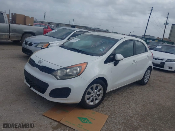 2012 Kia Rio LX with VIN KNADM5A37C6094193, listed as a IAAI auction lot 41940411 with 166,626 mi miles. Bid and sale history available at carsss.com. Image 2.