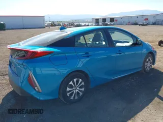 2022 Toyota Prius LE z VIN JTDKAMFP7N3198440, wystawiony jako IAAI lot #42147734 z przebiegiem 51 793 mil mil oraz . Historia ofert i sprzedaży dostępna na DreamBid. Obrazek 4.
