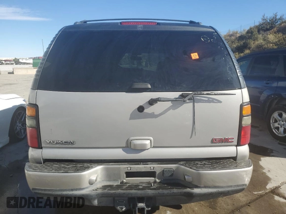 2005 GMC Yukon Denali z VIN 1GKEK63U35J228887, wystawiony jako Copart lot #68141304 z przebiegiem 238 024 mil mil oraz Szkoda całkowita • Salvage title. Historia ofert i sprzedaży dostępna na DreamBid. Obrazek 6.