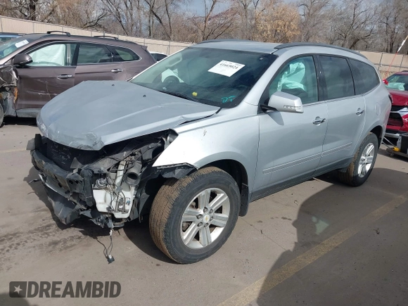2013 Chevrolet Traverse LT with VIN 1GNKVGKD6DJ240146, listed as a IAAI auction lot 41665024 with 118,648 mi miles and . Bid and sale history available at DreamBid. Image 2.