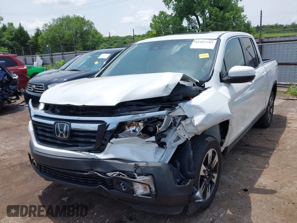 2020 Honda Ridgeline RTL with VIN 5FPYK3F51LB029859, listed as a IAAI auction lot 42462285 with 57,399 mi miles and . Bid and sale history available at DreamBid. Image 6.