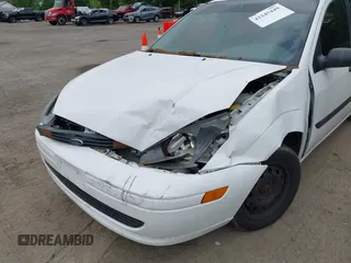 2002 Ford Focus LX with VIN 1FAFP33P42W350981, listed as a IAAI auction lot 42245449 with Not Provided miles and . Bid and sale history available at DreamBid. Image 6.