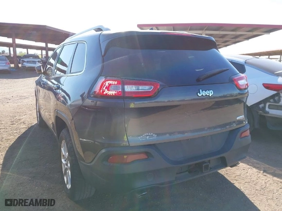 2014 Jeep Cherokee Latitude with VIN 1C4PJLCS3EW155236, listed as a IAAI auction lot 41877793 with 106,370 mi miles. Bid and sale history available at carsss.com. Image 3.