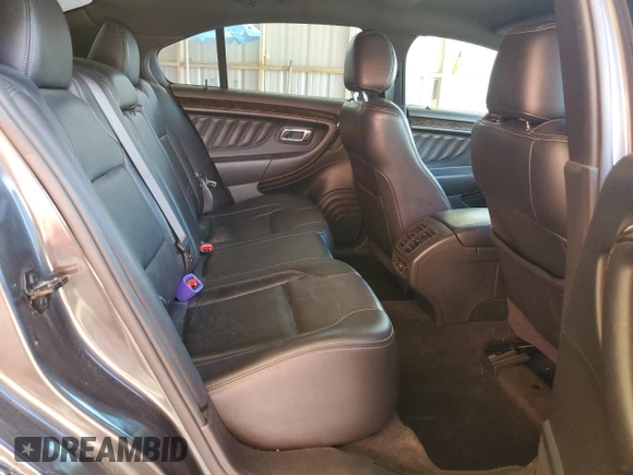 2018 Ford Taurus Limited z VIN 1FAHP2F87JG102207, wystawiony jako Copart lot #55647675 z przebiegiem 122 527 mil mil oraz Szkoda całkowita • Salvage title. Historia ofert i sprzedaży dostępna na DreamBid. Obrazek 10.