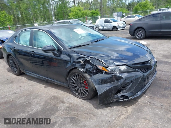 2023 Toyota Camry SE with VIN 4T1G11AK6PU829509, listed as a IAAI auction lot 42009085 with 35,864 mi miles and . Bid and sale history available at DreamBid. Image 1.