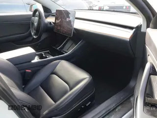 2020 Tesla Model 3 Long Range with VIN 5YJ3E1EB9LF620771, listed as a IAAI auction lot 41795008 with 53,155 mi miles and . Bid and sale history available at DreamBid. Image 5.